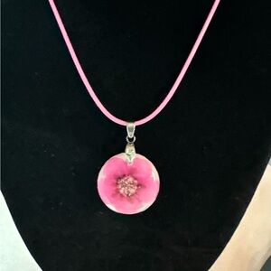 Resin pendant and necklace.